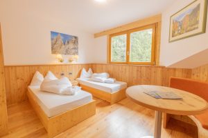 Camere Family room Berghotel Miramonti